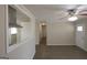 Spacious living room flows into hall and kitchen, featuring modern flooring at 5784 Sharon Dr, Norcross, GA 30071