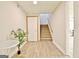 Basement featuring a stairwell and an accent plant next to a white table at 165 Hideaway Dr, Fayetteville, GA 30215