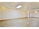 Large bonus room with neutral paint and wood flooring at 165 Hideaway Dr, Fayetteville, GA 30215