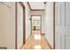 Hallway features wood trim and provides access to the kitchen area at 165 Hideaway Dr, Fayetteville, GA 30215