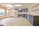 Updated kitchen includes stainless appliances, tiled backsplash, and modern cabinets at 165 Hideaway Dr, Fayetteville, GA 30215