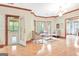 Bright living room featuring hardwood floors, bay window and elegant furniture at 165 Hideaway Dr, Fayetteville, GA 30215