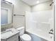 Bathroom with granite vanity, shower and toilet at 217 Point Ridge Ct, Temple, GA 30179
