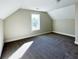 Bedroom featuring neutral colored walls and plush carpeting at 217 Point Ridge Ct, Temple, GA 30179