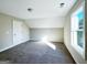 Bedroom featuring neutral colored walls and plush carpeting at 217 Point Ridge Ct, Temple, GA 30179
