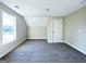 Bedroom featuring neutral colored walls and plush carpeting at 217 Point Ridge Ct, Temple, GA 30179