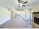 Open-concept living area flows seamlessly from the kitchen to the fireplace at 217 Point Ridge Ct, Temple, GA 30179