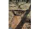 Scenic creek with a fallen log, adding natural beauty and charm to the surrounding landscape at 4389 & 4381 Campbell Rd, Snellville, GA 30039