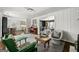 Well-appointed living room with a fireplace, open floor plan and hardwood flooring at 497 Pine Haven Ln, Atlanta, GA 30342