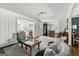 Bright living room with white walls, wood floors, and stylish furnishings at 497 Pine Haven Ln, Atlanta, GA 30342