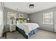 Serene bedroom with a comfortable bed, bedside tables, and ambient lighting at 497 Pine Haven Ln, Atlanta, GA 30342