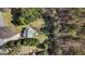 A birds-eye view of the home showing the large backyard, above ground pool, and storage shed at 115 Brook Hollow Dr, Mcdonough, GA 30252