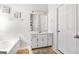 Bathroom with shower and bath tub, white vanity, and great natural light at 115 Brook Hollow Dr, Mcdonough, GA 30252