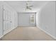 Neutral bedroom with carpet, ceiling fan and a window providing natural light at 115 Brook Hollow Dr, Mcdonough, GA 30252