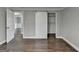 A bedroom features gray walls and a white sliding barn door leading to a closet with wire shelving at 5155 Rosestone Nw Dr, Lilburn, GA 30047
