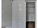White barn door leading to a closet with wire shelving in this spacious bedroom at 5155 Rosestone Nw Dr, Lilburn, GA 30047