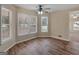 Bright, airy bonus room with wood flooring and large windows at 105 Overlook Dr, Mcdonough, GA 30252