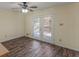 Bright dining area with wood flooring and doors leading to an outdoor deck at 105 Overlook Dr, Mcdonough, GA 30252