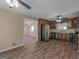 View of kitchen with stainless steel appliances and dark wood cabinets at 105 Overlook Dr, Mcdonough, GA 30252