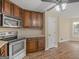 Close-up of kitchen features with stainless steel stove and microwave at 105 Overlook Dr, Mcdonough, GA 30252
