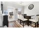 Cozy breakfast nook featuring a door to the backyard and a stylish, small dining table at 1734 Tricklin Spgs, Mcdonough, GA 30252