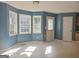 Bright dining area featuring large windows, tile floors, neutral color paint, and lots of light at 89 Farm Brook Ln # 17, Dallas, GA 30157