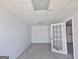 Open room with neutral walls and a doorway, offering flexible space at 89 Farm Brook Ln # 17, Dallas, GA 30157