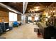 Spacious basement area with ample storage, workspace, and natural light, perfect for a workshop at 237 Summerford Pl, Stockbridge, GA 30281