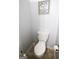 Powder room featuring a white toilet, clean lines, and neutral paint at 237 Summerford Pl, Stockbridge, GA 30281