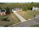 Charming home with a long driveway, front porch and well-manicured lawn in a tranquil, tree-lined neighborhood at 237 Summerford Pl, Stockbridge, GA 30281