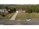 Charming brick home featuring a long driveway and a welcoming front porch, perfect for enjoying the outdoors at 237 Summerford Pl, Stockbridge, GA 30281