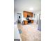 Spacious kitchen featuring wood cabinets, stainless steel appliances, and neutral flooring at 237 Summerford Pl, Stockbridge, GA 30281