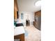 Well-lit kitchen with appliances and view to dining space at 237 Summerford Pl, Stockbridge, GA 30281