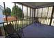 Spacious screened porch provides outdoor comfort with backyard views at 237 Summerford Pl, Stockbridge, GA 30281