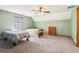 Bedroom featuring neutral carpet, a window with natural light, and traditional dresser at 375 Wellington Mill Rd, Whitesburg, GA 30185