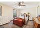 Bedroom featuring neutral carpet, a bed, and natural light from a window at 375 Wellington Mill Rd, Whitesburg, GA 30185