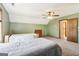 Bedroom featuring neutral carpet, two twin beds, and a window at 375 Wellington Mill Rd, Whitesburg, GA 30185
