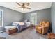 Bedroom with a bed, a recliner and natural light from the windows at 375 Wellington Mill Rd, Whitesburg, GA 30185