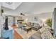Spacious living room featuring a fireplace, hardwood floors, and neutral paint at 720 Strawflower Ln, Locust Grove, GA 30248