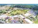 Aerial view showing the community park and the city buildings at 768 Scales Rd, Suwanee, GA 30024