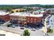 Aerial view showcasing street-level commercial and residential properties at 768 Scales Rd, Suwanee, GA 30024