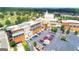 Aerial view showing a commercial property with apartments or condos and parking at 768 Scales Rd, Suwanee, GA 30024