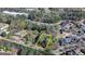Aerial view of a wooded homesite in a residential community, surrounded by trees and established homes at 768 Scales Rd, Suwanee, GA 30024