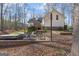 Backyard patio featuring a hot tub and fire pit area, ideal for relaxation at 595 S Antioch Rd, Mcdonough, GA 30252
