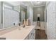 Bathroom with a white vanity, framed mirror, and stylish fixtures at 595 S Antioch Rd, Mcdonough, GA 30252