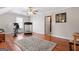 Bonus room features hardwood floors, ceiling fan, and potential for gym or office at 595 S Antioch Rd, Mcdonough, GA 30252