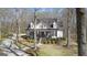 Charming home features a welcoming front porch and well-manicured landscaping at 595 S Antioch Rd, Mcdonough, GA 30252