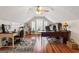Bright home office with hardwood floors, vaulted ceiling, and large windows at 595 S Antioch Rd, Mcdonough, GA 30252