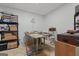 A quiet office area with practical and functional shelves and desk at 308 Tussahaw Trl, Locust Grove, GA 30248