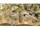 Panoramic aerial view of homes nestled among trees with a beautiful lakeside setting at 171 Rockspray Rdg, Peachtree City, GA 30269
